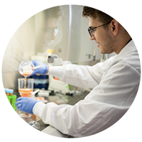 Men doing experiment in Lab